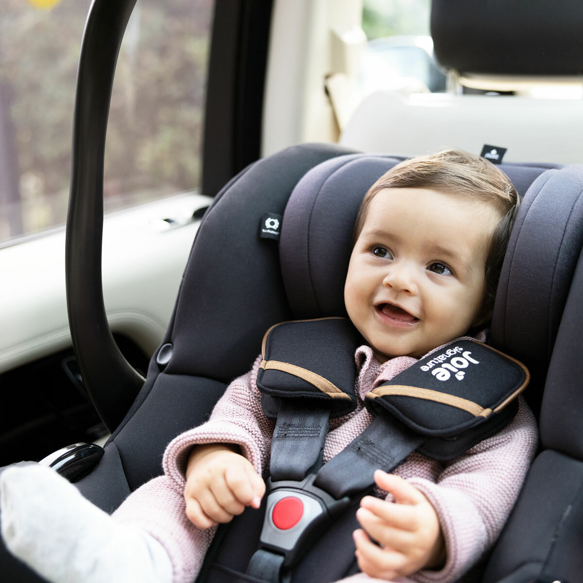 Lifestyle image of child in car seat