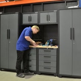 Lifestyle image of cabinet set with man working