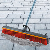 Lifestyle image of broom in outdoor use