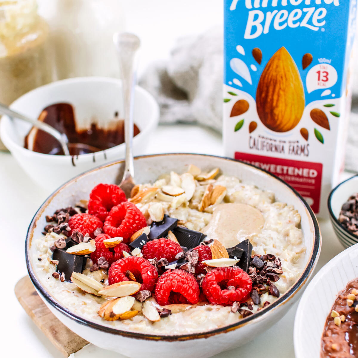 Carton of Table with Bowl of Granola