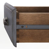 Close up fo drawer showcasing dovetail design and metal runner