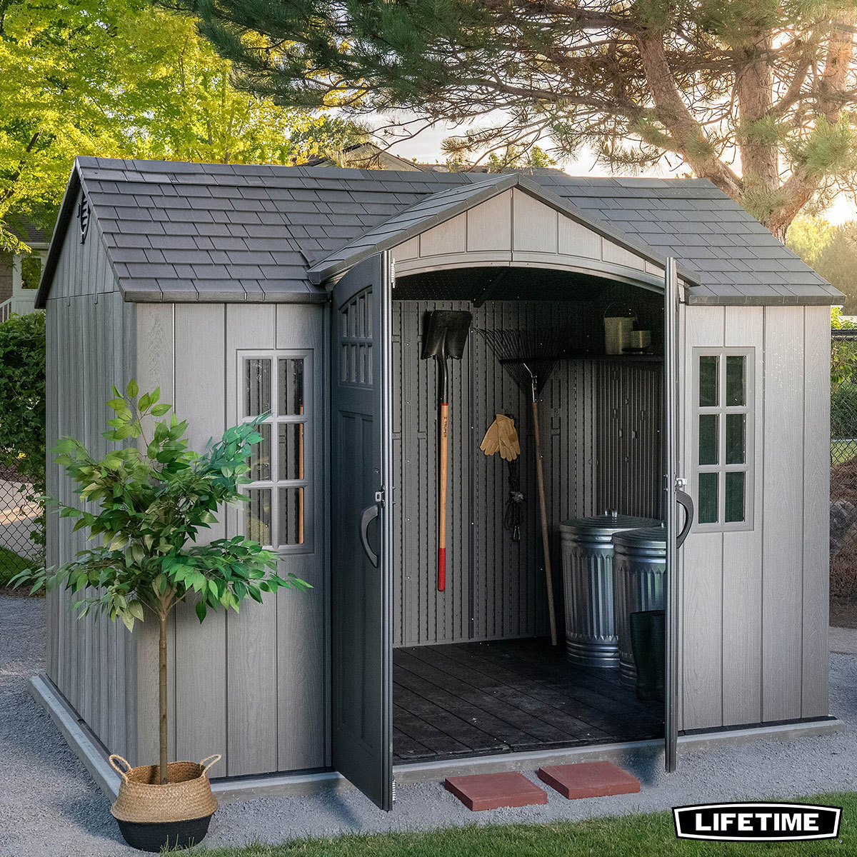 lifetime 8x10 outdoor storage shed with gardening tools inside