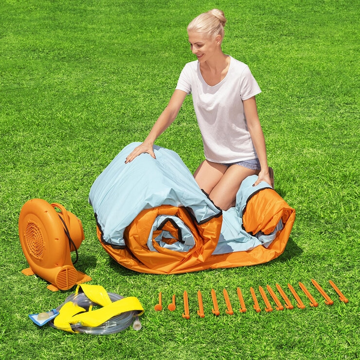 Lifestyle image of a woman setting up the blower