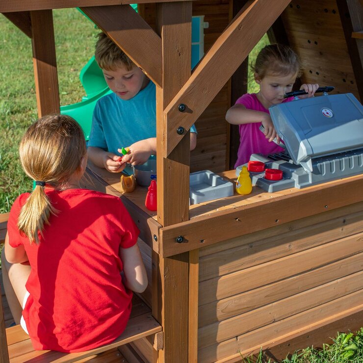 Lifestyle image of children playing in the kitchen area
