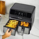 Lifestyle image of sur la table dual basket air fryer with drawers open