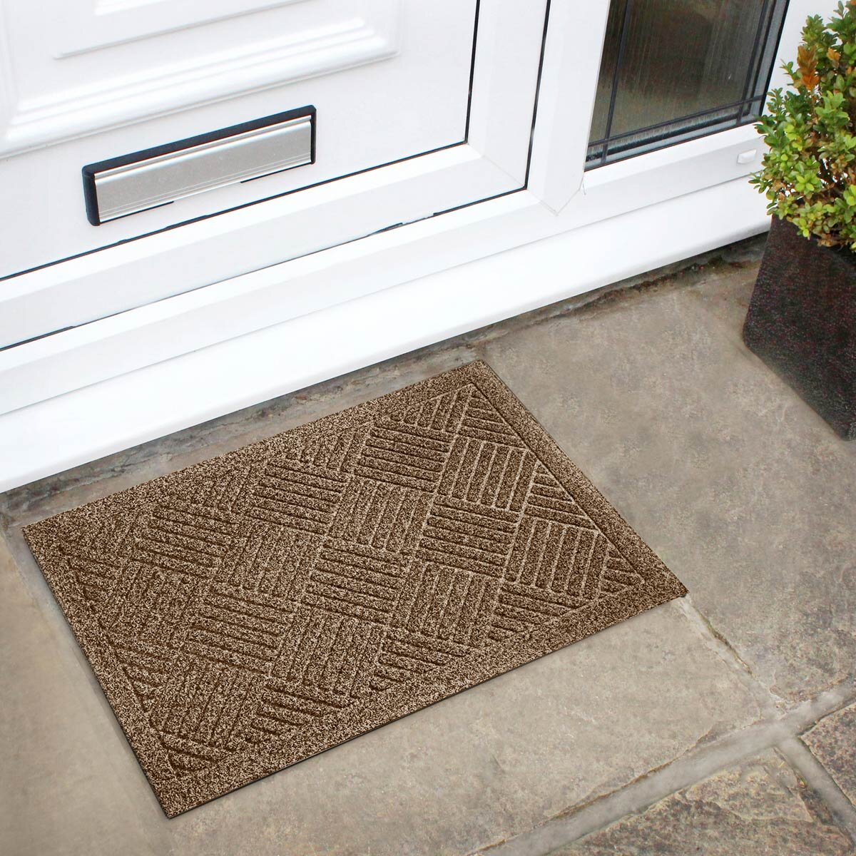 Lifestyle image of mats outside front door