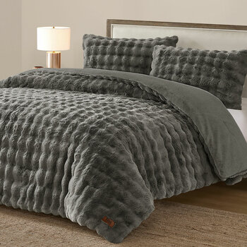 3 piece grey bubble faux fur comforter set, including two decorative pillows.