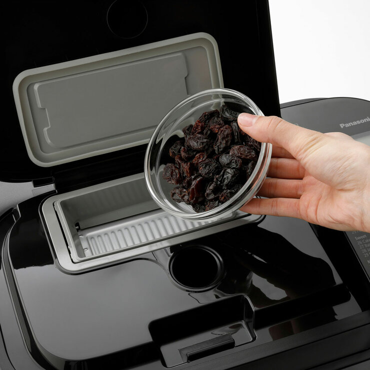 Dried fruit going into Panasonic Bread Maker