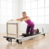 At Home SPX Reformer Package with Jumpboard and Mat Converter by Merrithew®/STOTT PILATES®