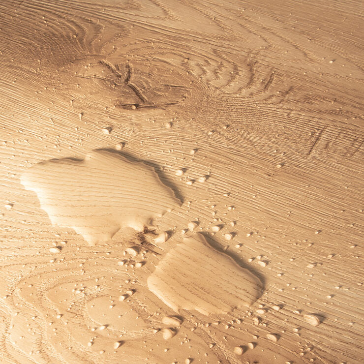 Close up image of planks with water on surface Close up image of planks with water on surface