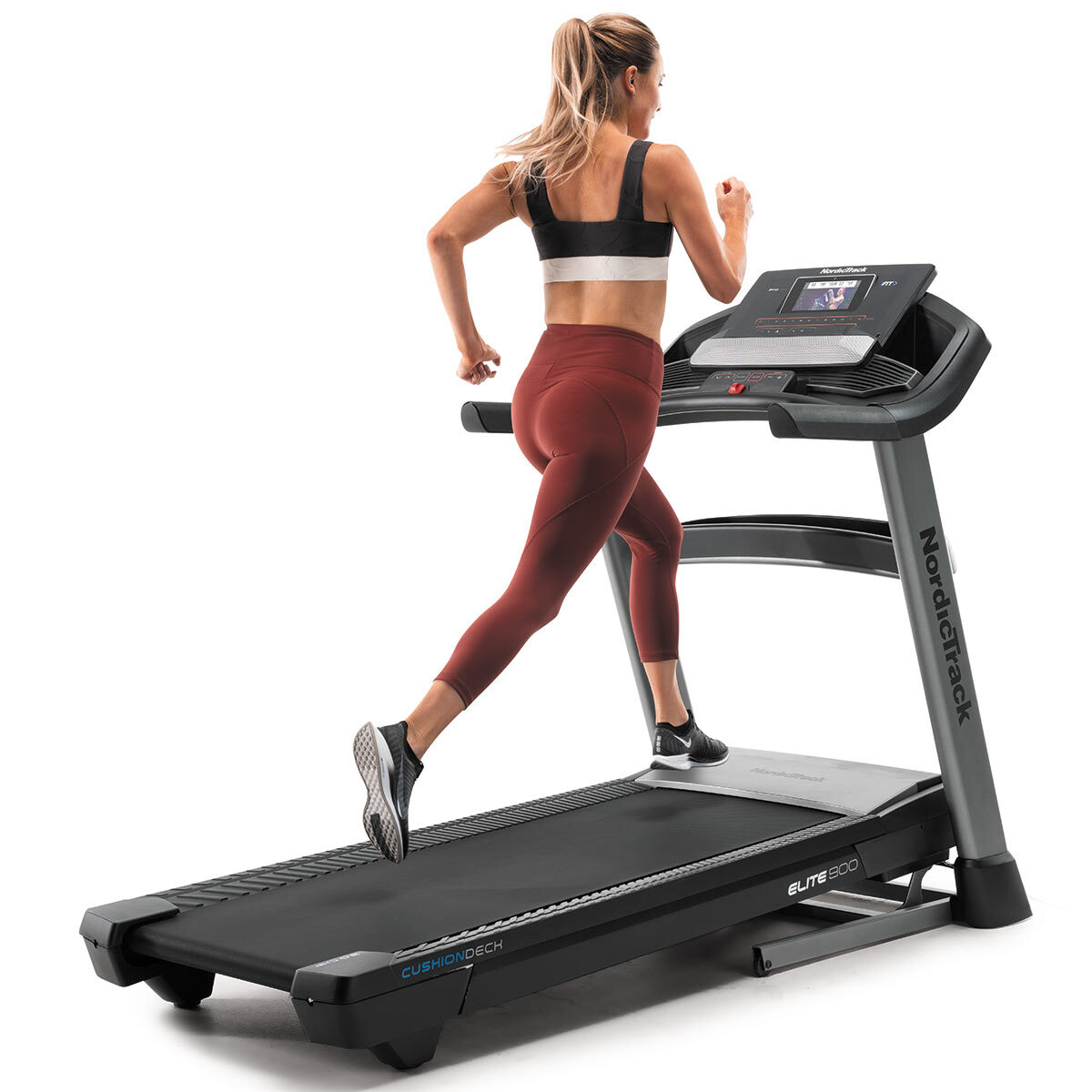 Woman Running on Nordic Track Elite 900 Treadmill