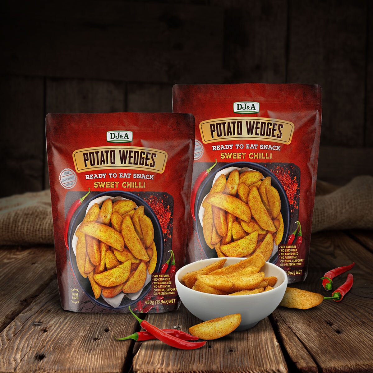 Lifestyle Image of 2 Packs with Chilli and Wedges on a Table