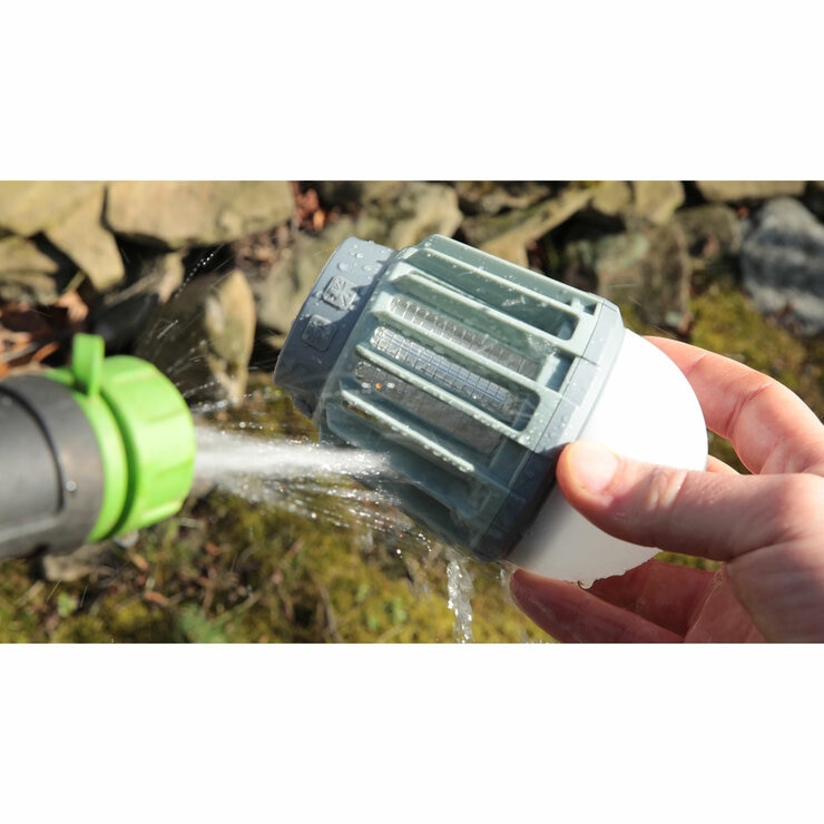Lifestyle image showing someone hosing down the zapper.