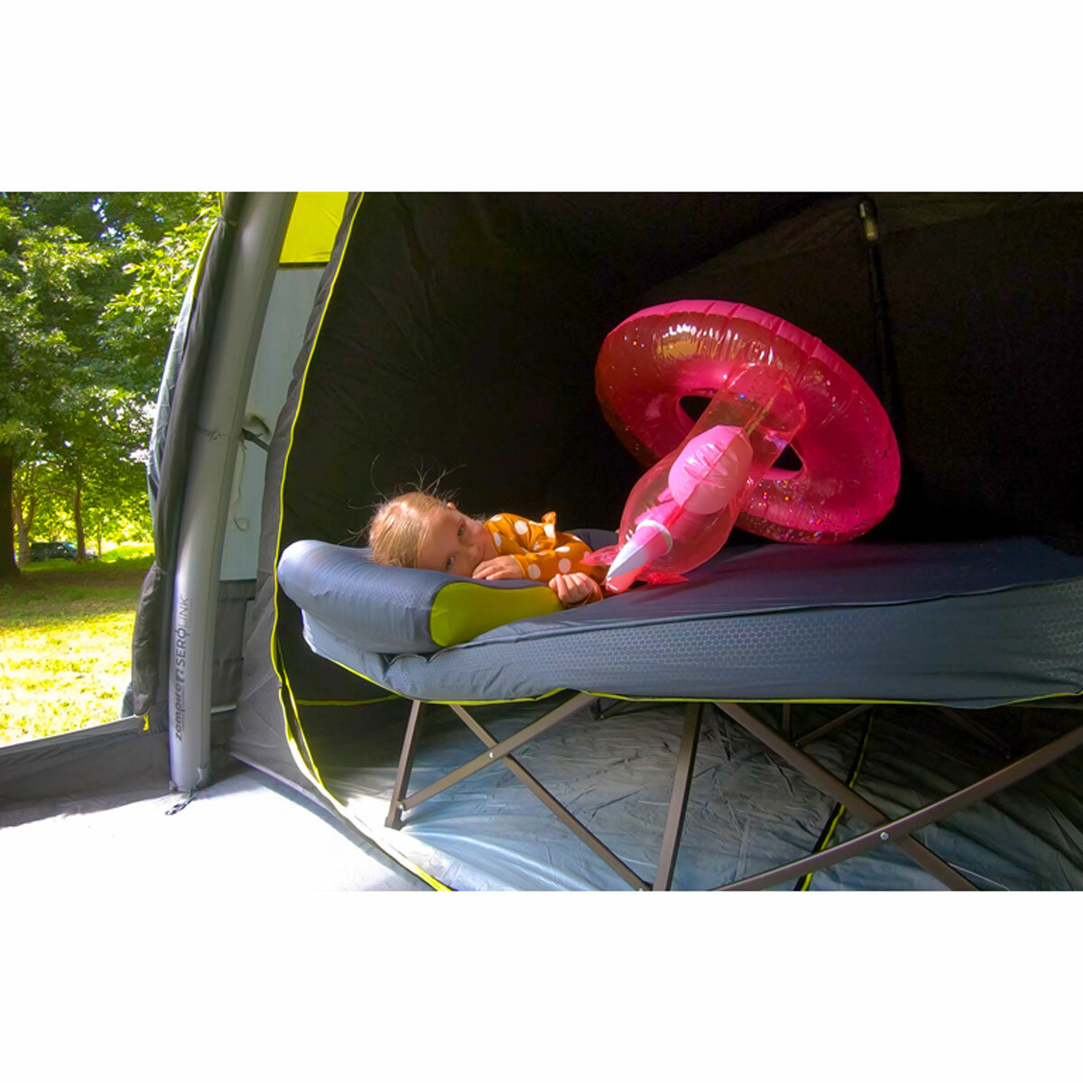 Lifestyle image of a child laying on the mattress