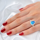 Pear Cut Blue Topaz & 0.66ctw Diamond Ring, 18ct White Gold