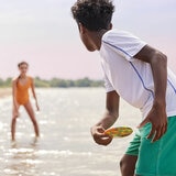 Lifestyle image of someone throwing a skip disc