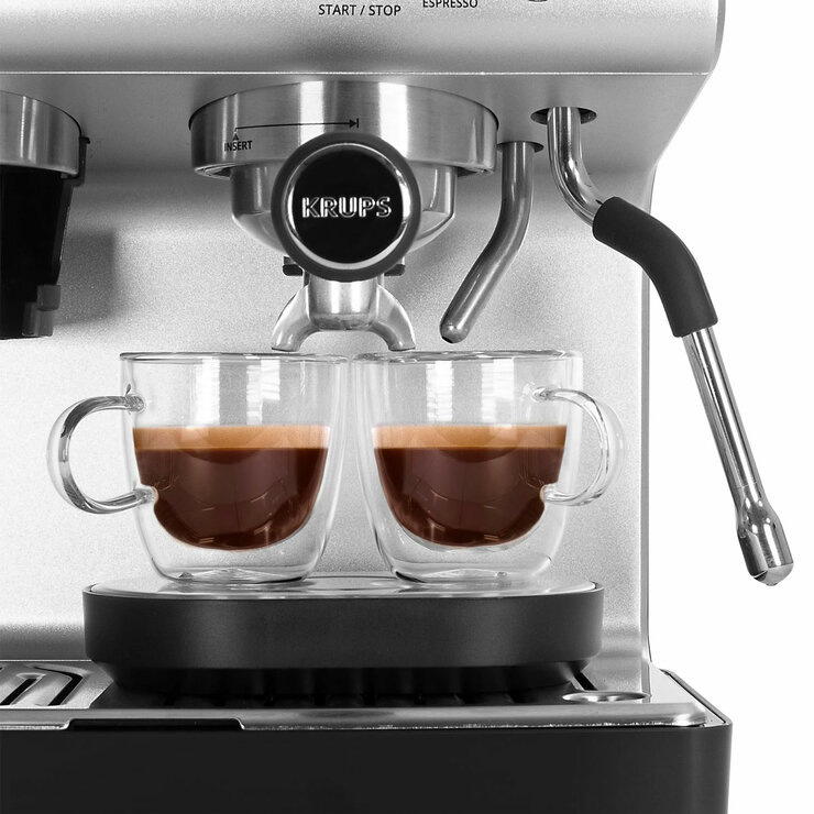 Close up of Krups Precision Coffee Machine making 2 coffees at ones