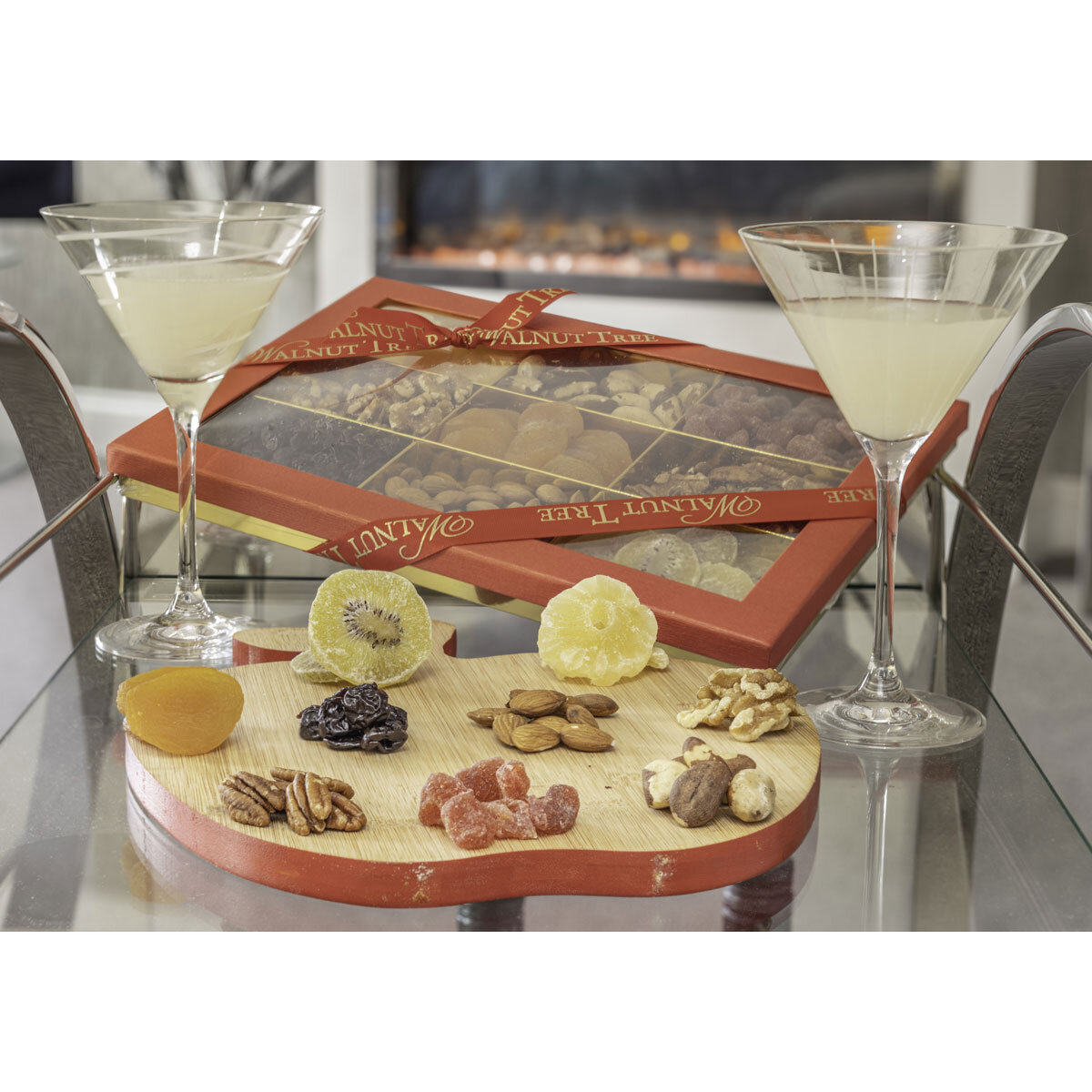 Walnut Tree Fruit & Nut Platter Closed with Contents Laid In Front with Two Drinks