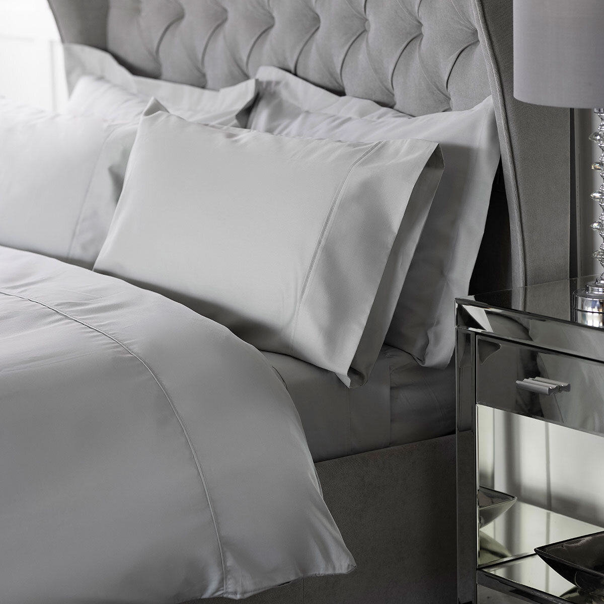 belledorm platinum bamboo housewife pillowcases on bed