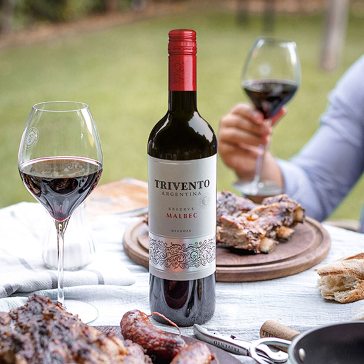 Lifestyle image of bottle on outdoor table