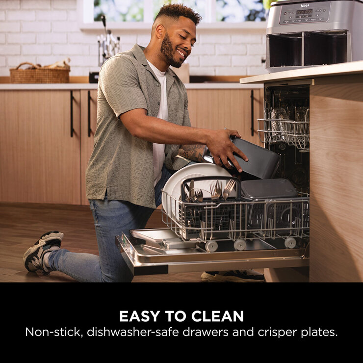 Lifestyle image of model putting dishwasher safe parts into a dishwasher Lifestyle image of model putting dishwasher safe parts into a dishwasher