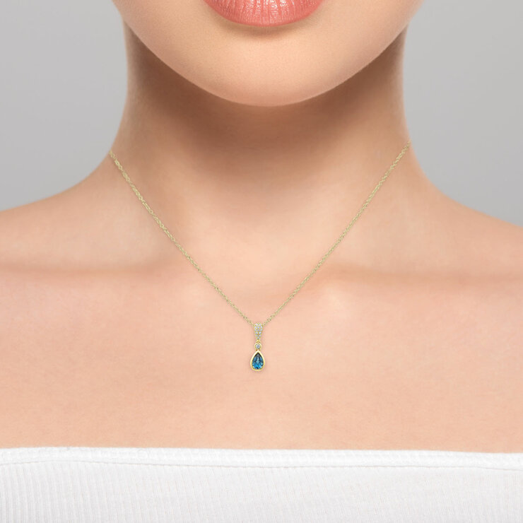 Pear Cut Blue Topaz & 0.07ctw Diamond Pendant, 18ct Yellow Gold