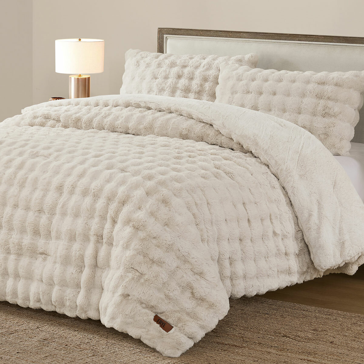 3 piece cream bubble faux fur comforter set, including two decorative pillows. 3 piece cream bubble faux fur comforter set, including two decorative pillows.