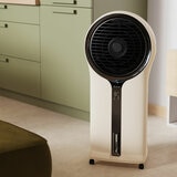 Lifestyle image of Duux Mist Air Cooler in living room