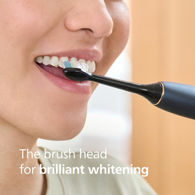 Philips Brush Head 6 Pack in White brushing teeth