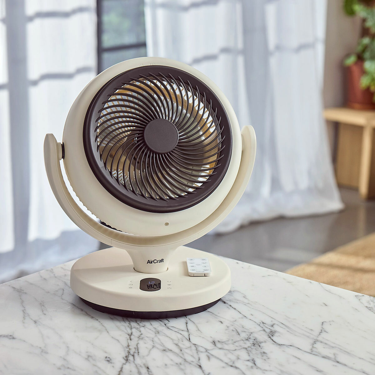 Lifestyle image of AirCraft Lume Mini Air Circulator on kitchen counter top Lifestyle image of AirCraft Lume Mini Air Circulator on kitchen counter top