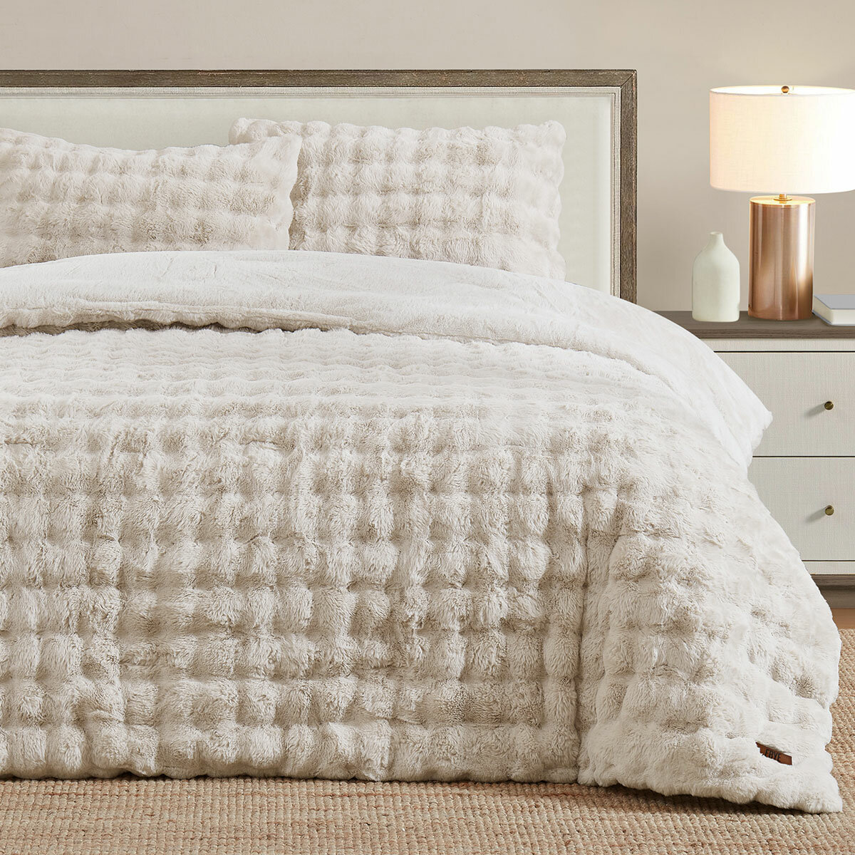 Cream bubble faux fur comforter set, including two decorative pillows styled on bed Cream bubble faux fur comforter set, including two decorative pillows styled on bed