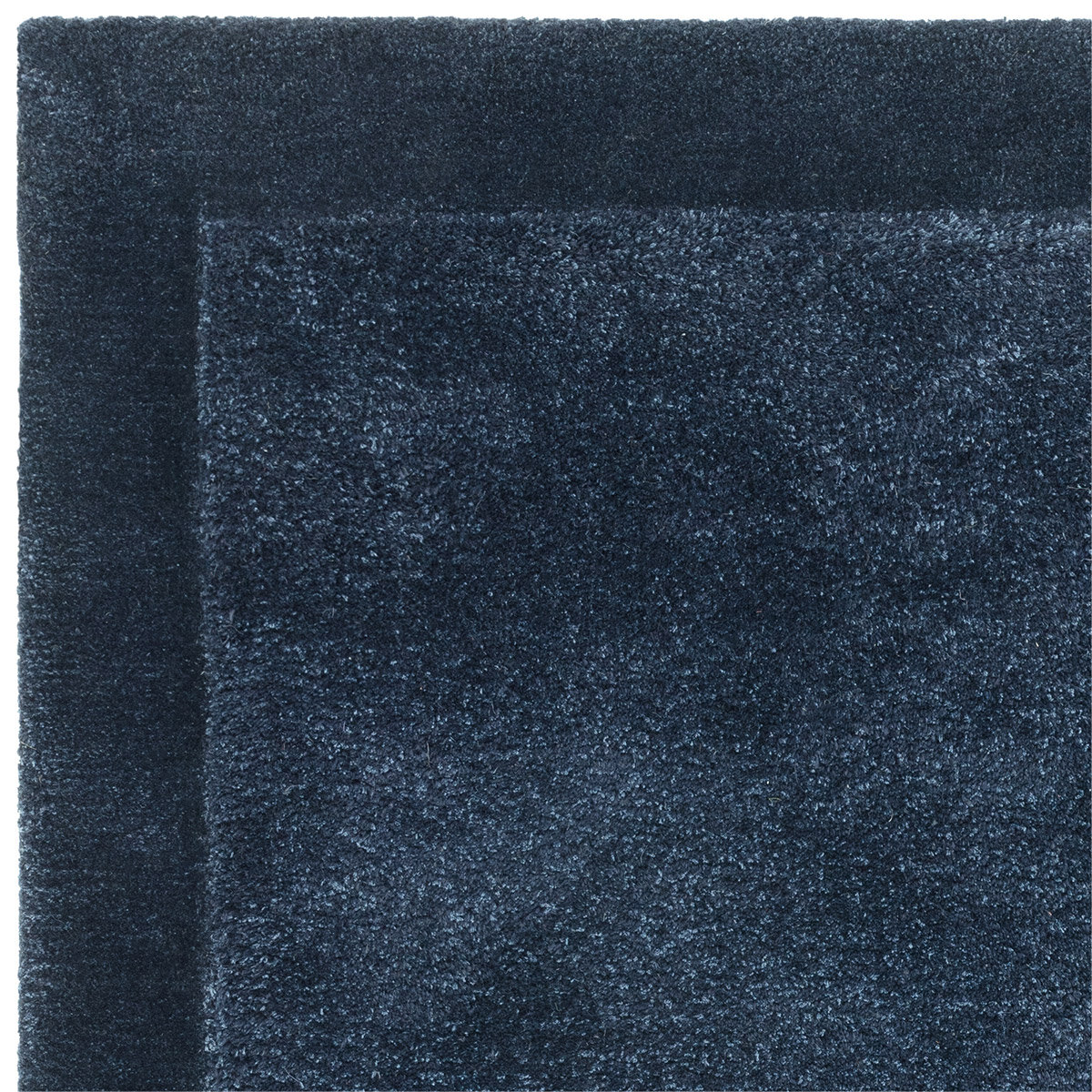 Asiatic rise border rug in navy