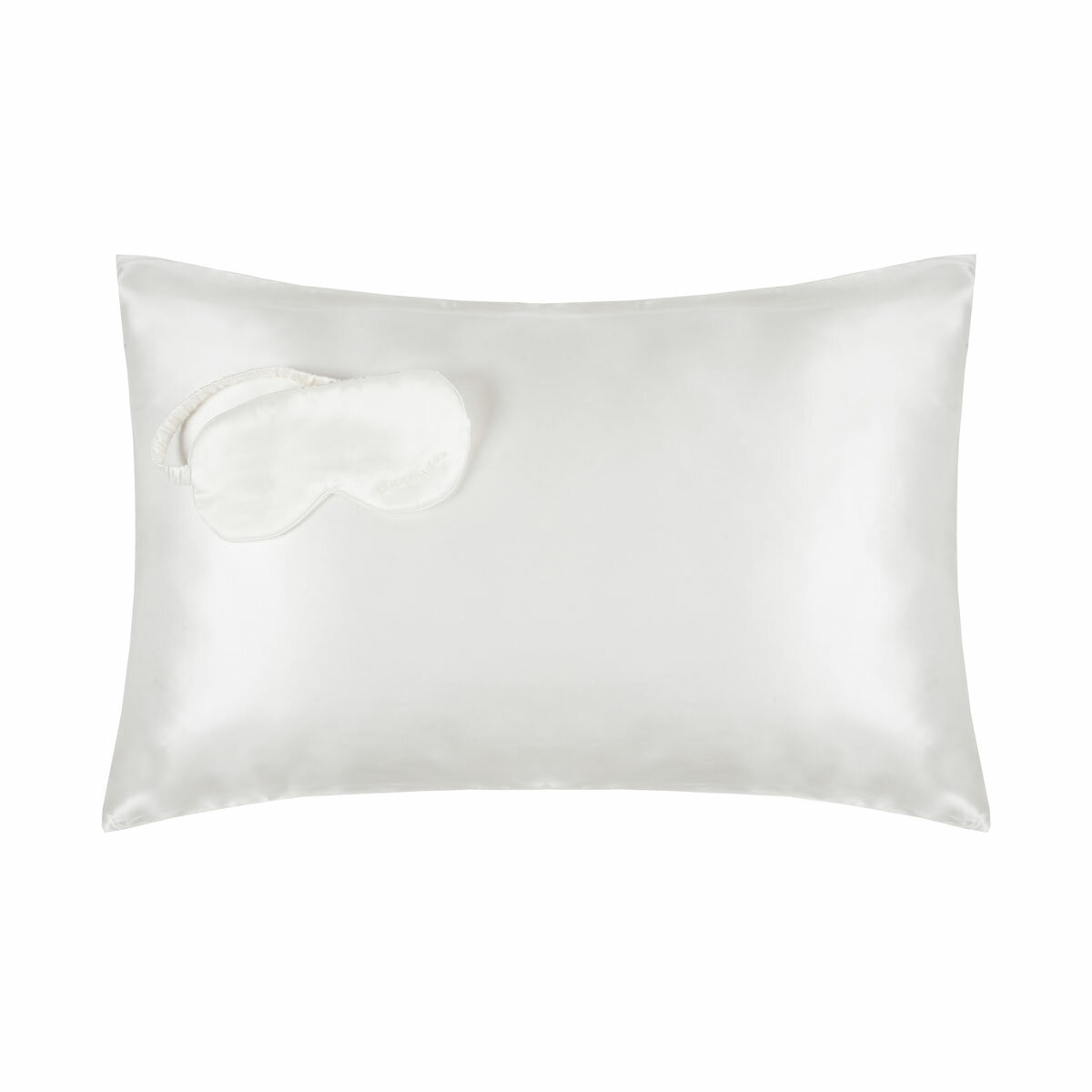 White silk pillowcase with matching padded sleep mask. Elegant, minimalist design enhances sleep quality and comfort. White silk pillowcase with matching padded sleep mask. Elegant, minimalist design enhances sleep quality and comfort.