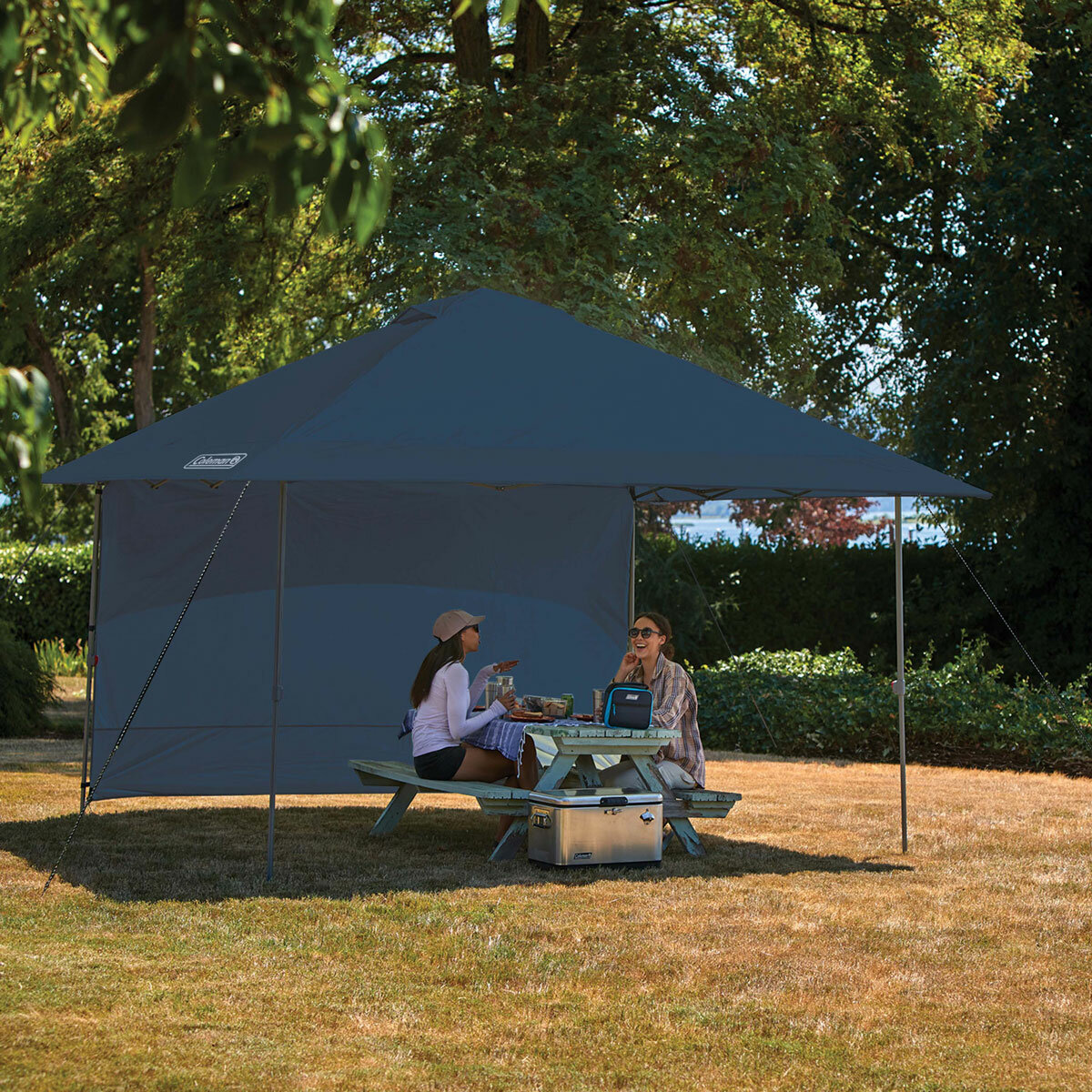 Lifestyle image fo two people sat underneath the canopy