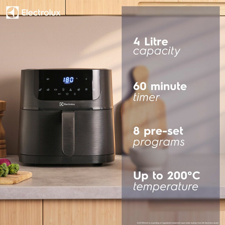 Lifestyle image of air fryer on kitchen counter top showing key features Lifestyle image of air fryer on kitchen counter top showing key features