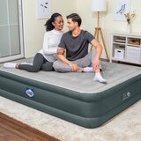 Lifestyle image of two people sat on the airbed Lifestyle image of two people sat on the airbed