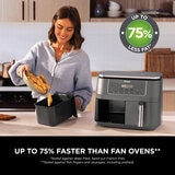 Lifestyle image showing air fryer being used Lifestyle image showing air fryer being used
