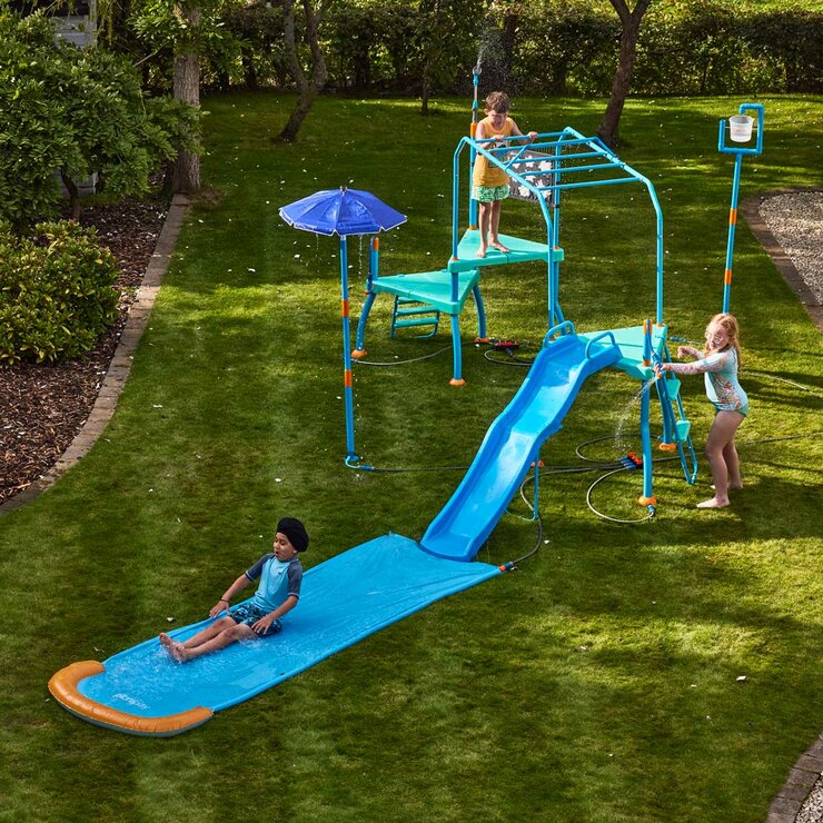 Lifestyle image showing three children playing on the Plum Water Park Blaster Course from an arial angle