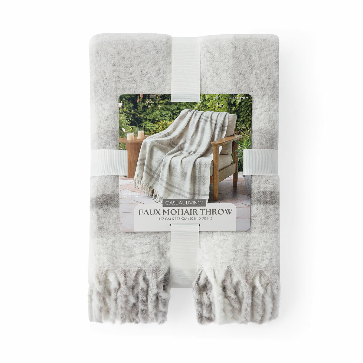 Folded Grey Mohair Faux Fur throw, with outer packaging shown Folded Grey Mohair Faux Fur throw, with outer packaging shown