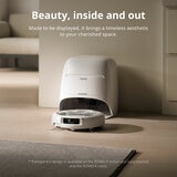 Lifestyle image of DJI ROMO A Robot Vacuum in a living room