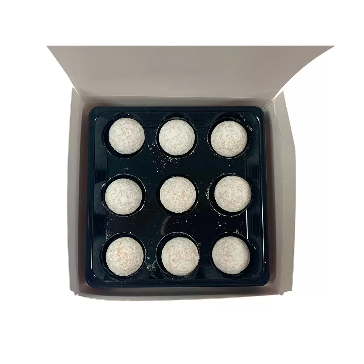 Open Box Showing 9 Champagne Truffles
