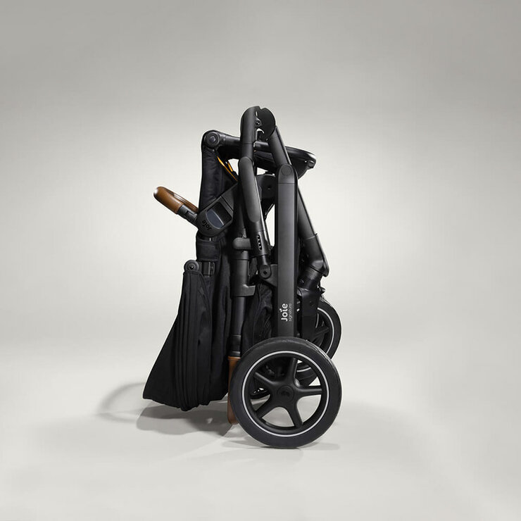 Studio image of the stroller, folded