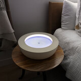 Lifestyle Image of the Homedics Drift Sandscape table next to bed