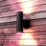 Lifestyle image of outdoor lights on wooden wall