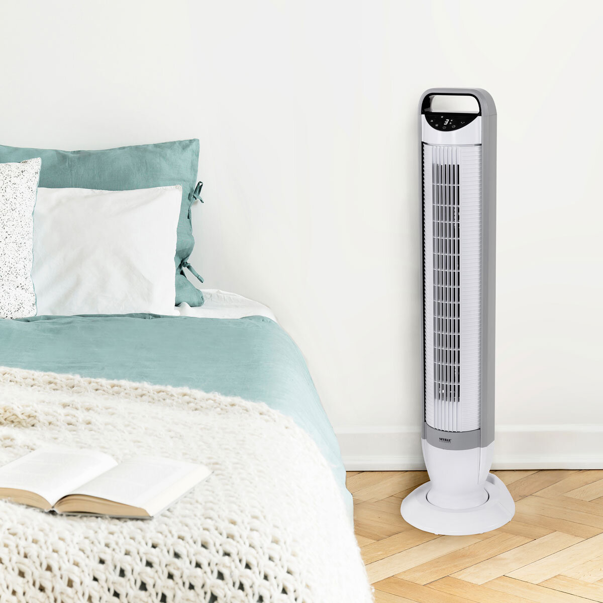 Lifestyle image of Seville Slimline Digital Fan with bed
