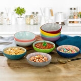 signature houseware stoneware bowls with food on kitchen counter