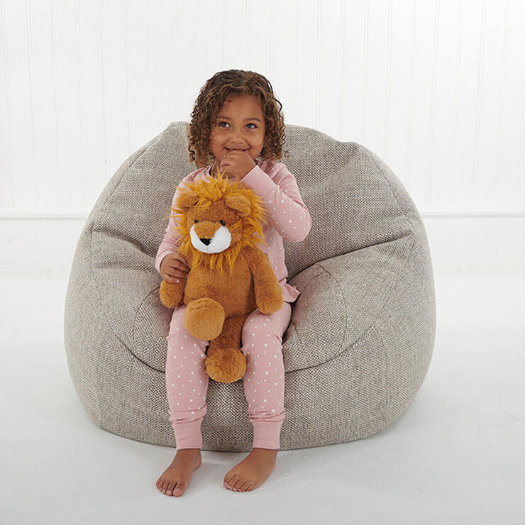 Girl Sitting Down Cuddling Lion Girl Sitting Down Cuddling Lion