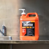Lifestyle Image of Swarfega 5L Orange Hand Cleanser by the sink