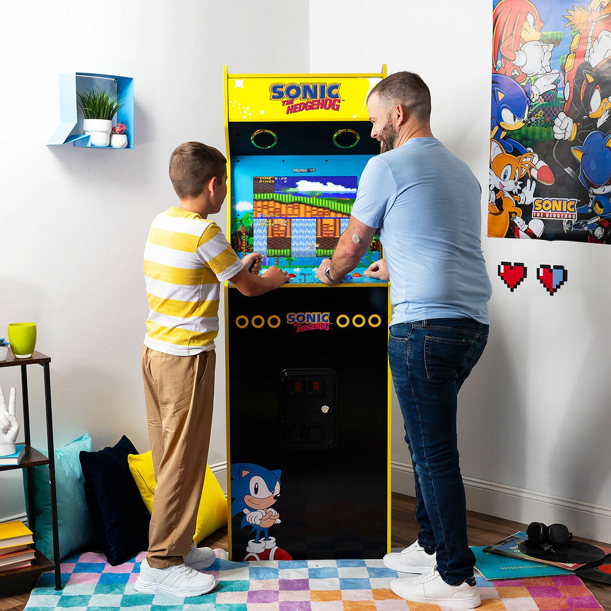 Lifestyle image of a man and child playing on the machine