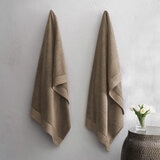 Two taupe towels hanging
